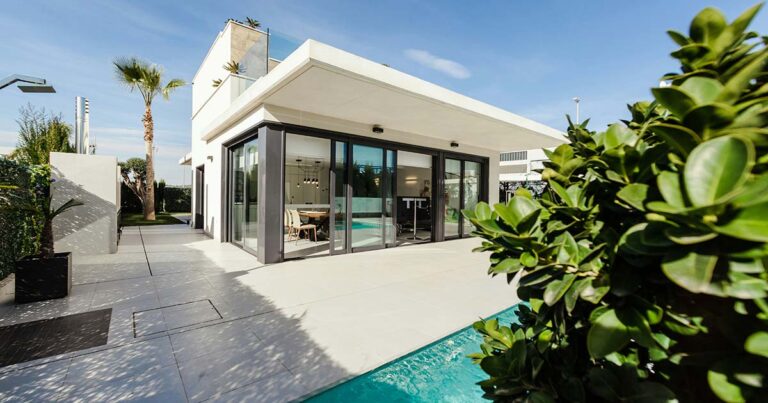 Home exterior with swimming pool in California