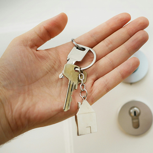 A hand holding keys